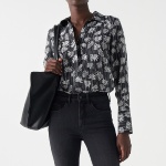 Blouse Salsa noire avec motifs blancs imprimés